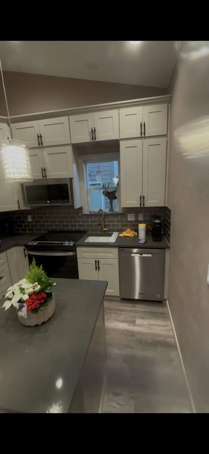 Kitchen with an island in the Forest Grove ADU